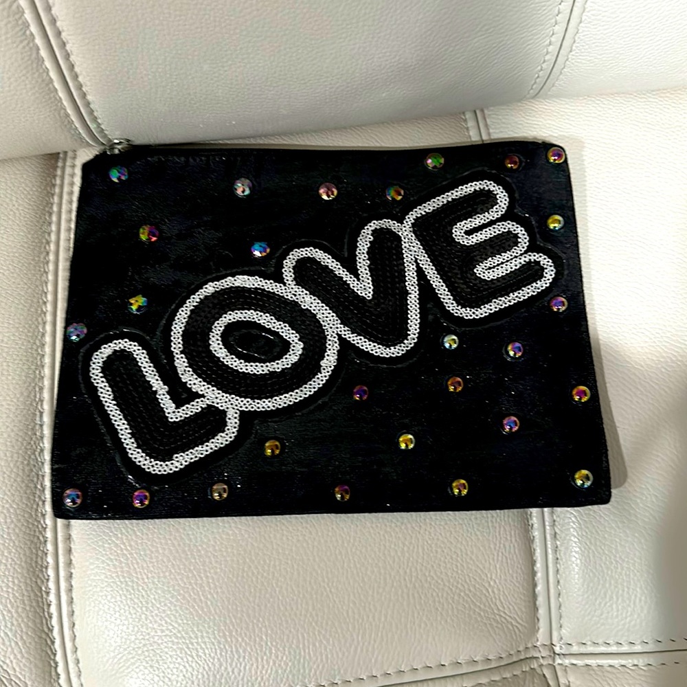 Clutch painted handbag